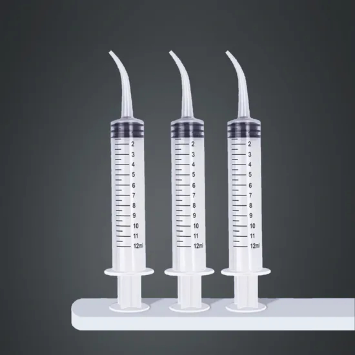 Consumable Syringe with Curved Tip